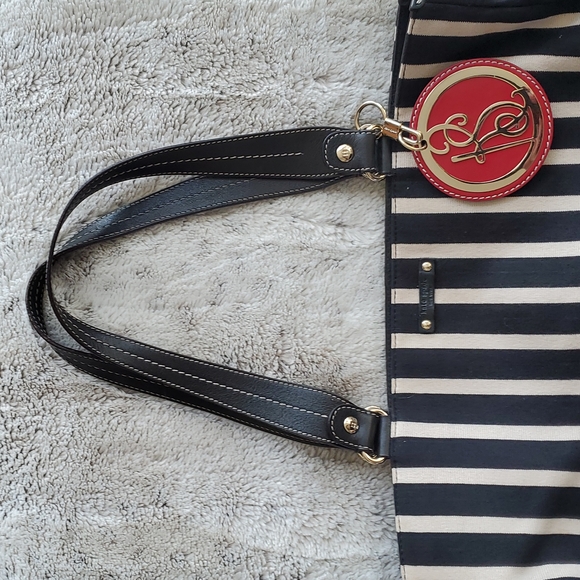Kate Spade Black and Cream Horizontal Multi Pocketed Tote Purse Bag w Charm - Picture 2 of 9